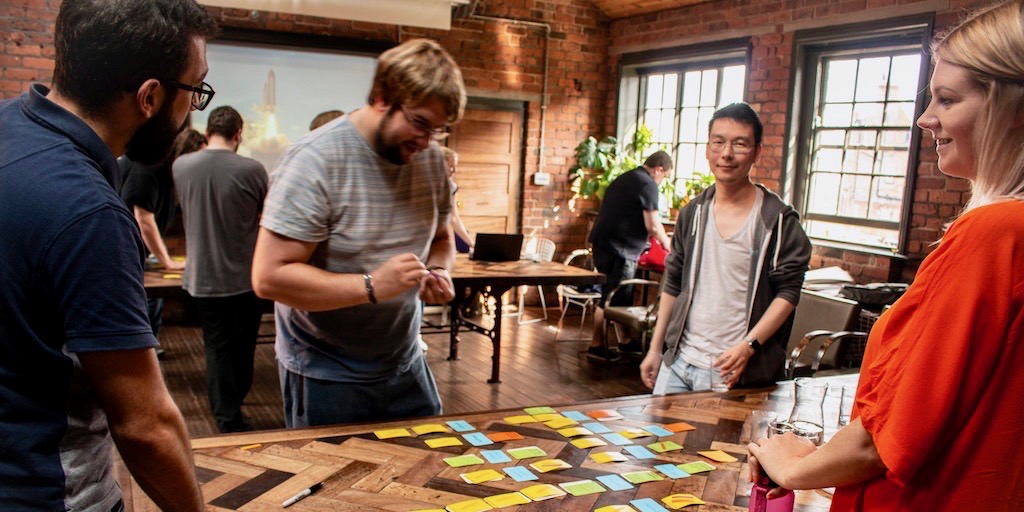 Claudiu, James, Shuo and Lauren participating in an epiGenesys away day.